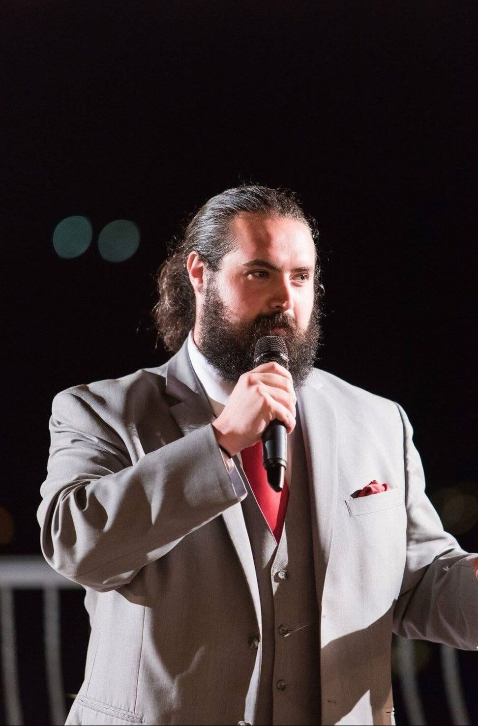 Mike Jauregui speaking at a live event